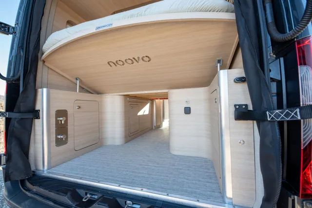 Noovo Next rear gear garage close up under the Noovo branded lift bed