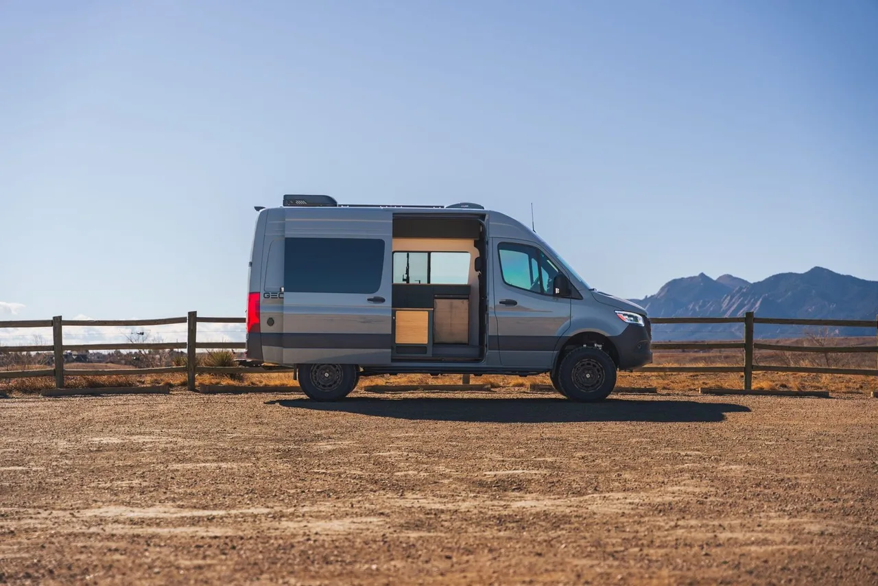 GeoTrek Flatiron camper van parked on a mountain road