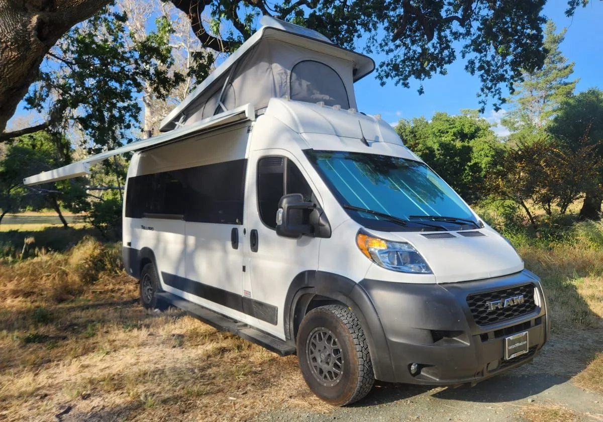 Thor Motor Coach Tellaro camper van parked at an outdoor campsite