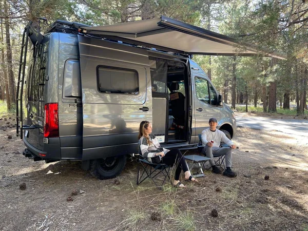 Winnebago Revel camper van parked on a rugged backcountry road