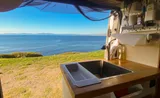 Kitchen area in Ford Transit Class B camper van rental in GLENDALE California