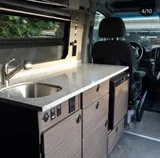 Kitchen area in Springer With Pop Class B camper van rental in Bellevue Washington
