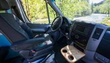 Driver cockpit of Mercedes-Benz Wild Blu camper van rental in Bellevue Washington