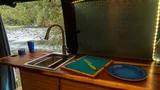 Kitchen area in Mercedes-Benz Wild Blu Class B camper van rental in Bellevue Washington