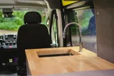 Kitchen area in Basecamp promaster Class B camper van rental in Asheville North Carolina