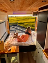 Bed setup inside Dodge Ellsworth camper van rental in Hatboro Pennsylvania