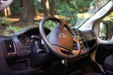 Driver cockpit of Dodge Alpenglow camper van rental in Bellevue Washington
