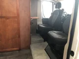 Driver cockpit of FL #44 Lexor camper van rental in Eastvale California