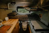 Bed setup inside Dodge Your New BFF camper van rental in Bellevue Washington