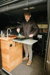 Kitchen area in Dodge Your New BFF Class B camper van rental in Bellevue Washington