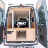 Dining area in Forged Vans Sprinter camper van rental in Bellevue Washington
