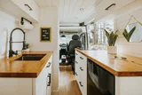 Kitchen area in Noma Vans Promaster 2500 Class B camper van rental in Bellevue Washington