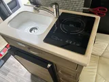 Kitchen area in Midwest Automotive Designs Passage Class B camper van rental in GLENDALE California