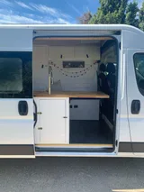 Kitchen area in Dodge Squatchy Class B camper van rental in Durango Colorado