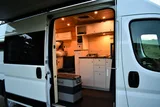 Kitchen area in Ram Sunset Class B camper van rental in Spokane Washington