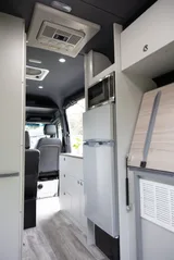 Kitchen area in TrueVan Vision X Class B camper van rental in Eastvale California