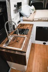 Kitchen area in Wheel Suite Promaster 3500 Class B camper van rental in Hackensack New Jersey
