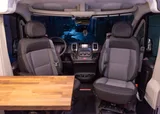 Driver cockpit of Wheel Suite Promaster 3500 camper van rental in Hackensack New Jersey