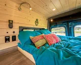 Bed setup inside Camp N Car Van! camper van rental in Marysville Washington