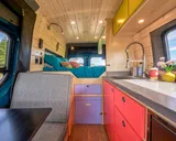 Bed setup inside Camp N Car Van! camper van rental in Marysville Washington