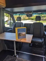 Driver cockpit of Navan Vans Guinevere camper van rental in Bellevue Washington