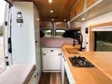 Kitchen area in Scenic Vans Aspen Class B camper van rental in Roseville California