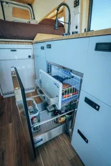 Kitchen area in Scenic Vans Aspen Class B camper van rental in Roseville California