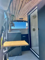 Kitchen area in Ford Transit Class B camper van rental in GLENDALE California