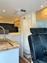 Kitchen area in Wheel Suites Grand Suite Class B camper van rental in Hackensack New Jersey