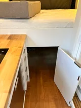 Kitchen area in Wheel Suites Grand Suite Class B camper van rental in Hackensack New Jersey