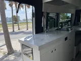 Kitchen area in Pleasure Way Ontour 2.2 Class B camper van rental in Orlando Florida